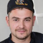 Николай